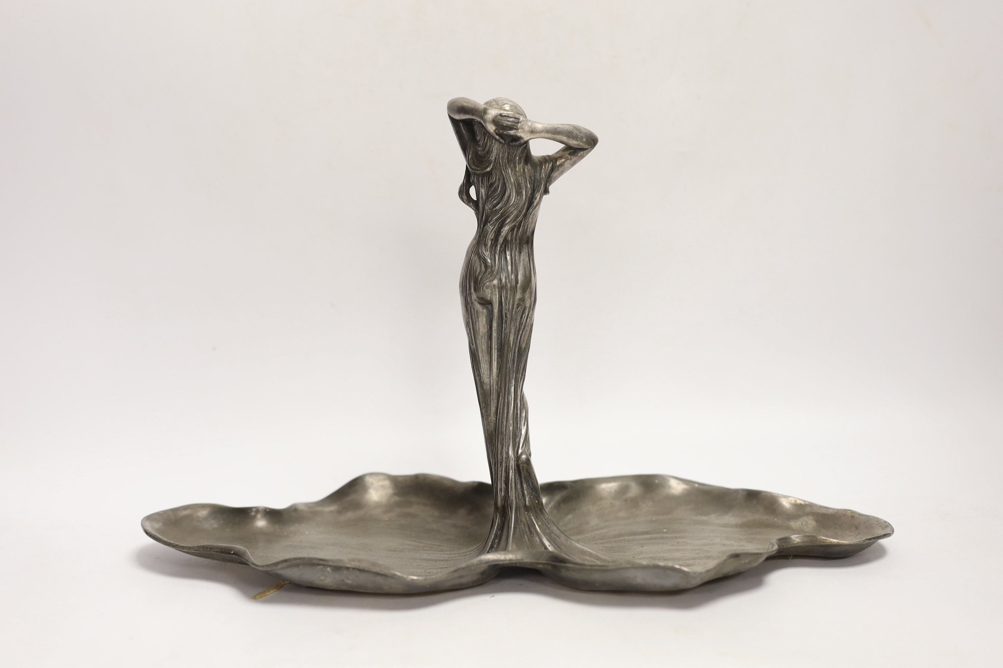 An Art Nouveau WMF pewter dish with a figure of a woman on lily pads, 22cm high
